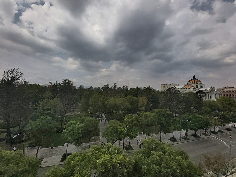 Panoramic view of Alameda Central park with trees fountains and pathways in Mexico City