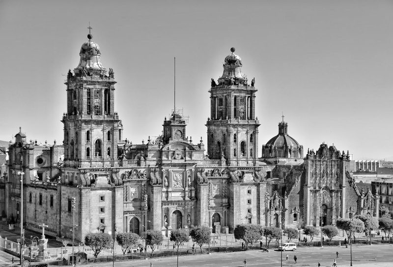 Black and white photograph of the Metropolitan Cathedral towers showcasing baroque architectural details