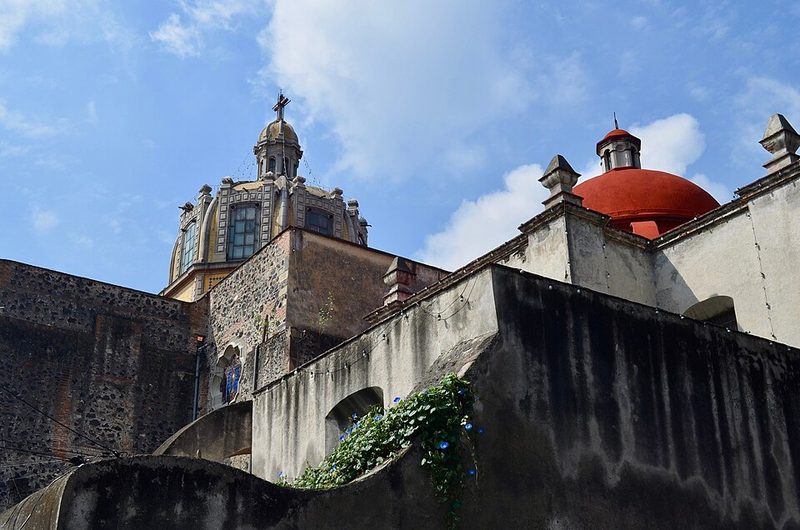Side view of the Parish of San Juan Bautista historic church in Coyoacan Mexico City