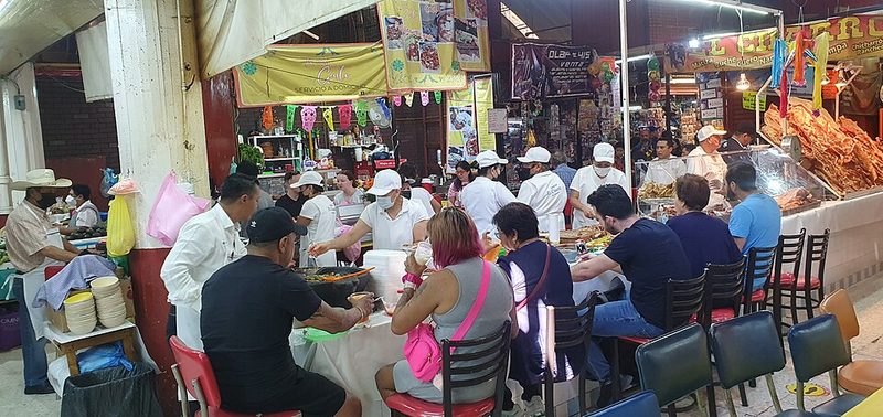 Bustling interior of the Mercado de Coyoacan food market in Mexico City