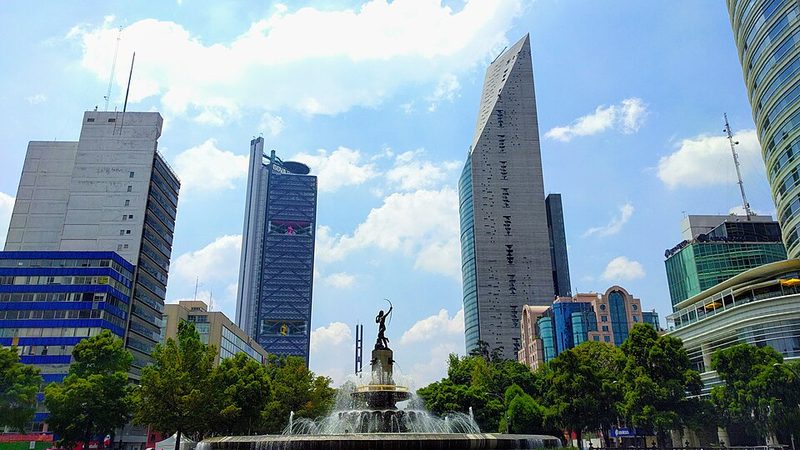 Wide landscape view of the Diana Cazadora Fountain showing the full sculpture and fountain basin