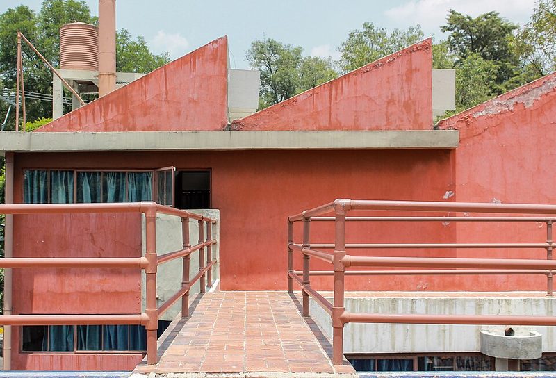 Red and white facade of Diego Rivera studio designed by Juan O Gorman in San Angel Mexico City