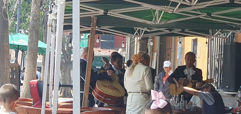 Mariachi musicians playing at Plaza Garibaldi in Mexico City