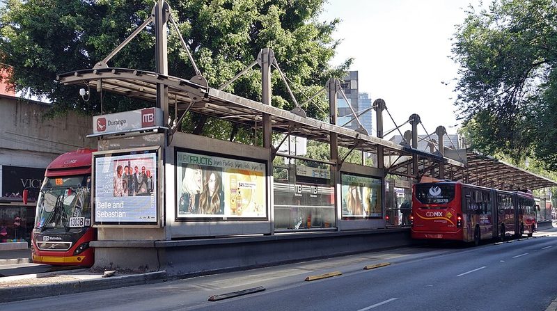 Metrobus articulated bus on dedicated lane in Mexico City