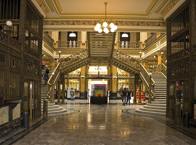 Ground floor interior of the Palacio Postal showing ornate architecture and service counters