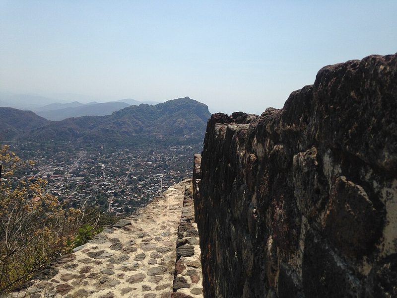 View of the Tepozteco pyramid and surrounding mountains from above in Tepoztlan