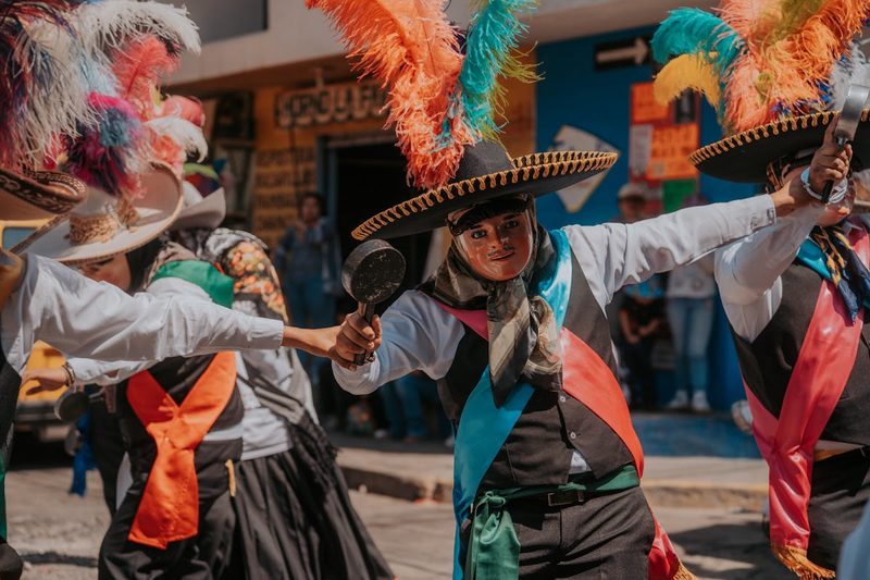 Vibrant traditional dancers in Puebla Mexico celebrating cultural heritage with colorful costumes