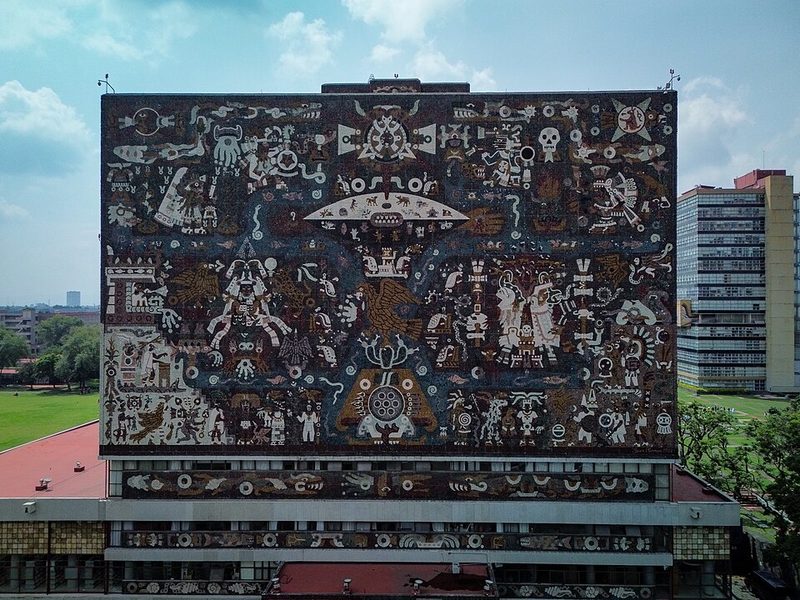 Aerial view of the iconic UNAM Central Library with Juan O Gorman mosaic-covered facade