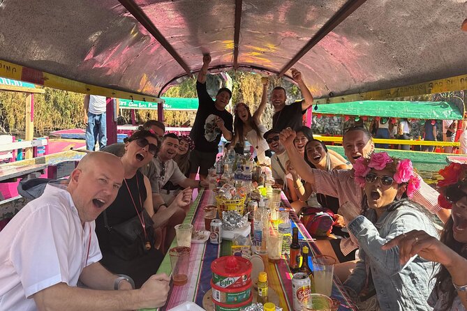 Boat tour in Mexico City with Live Guide with Food and Drinks - Drinks, games, and the real tone of the experience