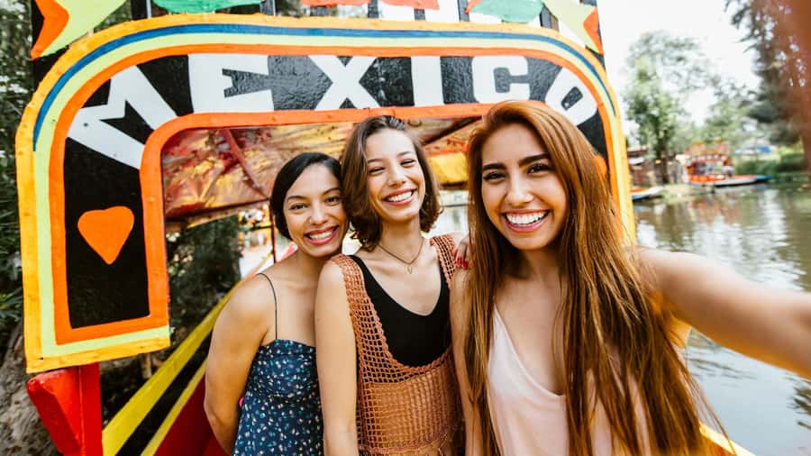 CDMX: Xochimilco Trajinera Party, Drinks, Mariachi & Tacos - Boarding the flower-painted trajinera