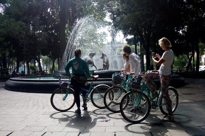 Frida's Heart Guided Biking Tour in Coyoacán - Plaza Centenario, fountains, and the old cathedral
