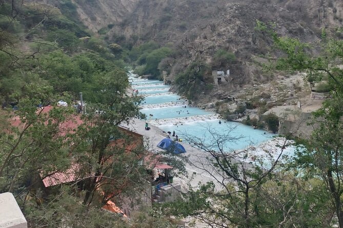 Full Day Private Tour to Tolantongo Caves from CDMX - Turquoise river time below the mountain
