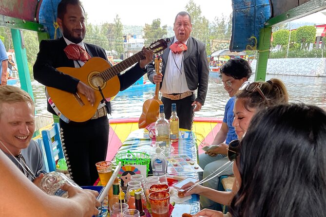 Mexico City Canals by Boat with Live Commentary with Meal Drinks - Xochimilco’s canals, seen from a trajinera