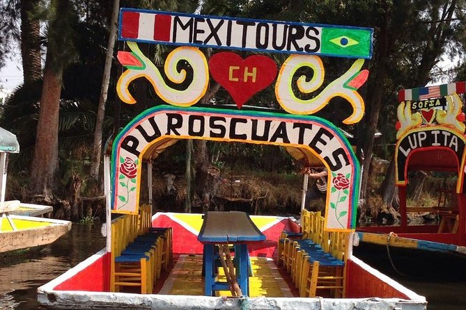Mexico City Tour And Xochimilco - Xochimilco begins with a boat, birds, and canals