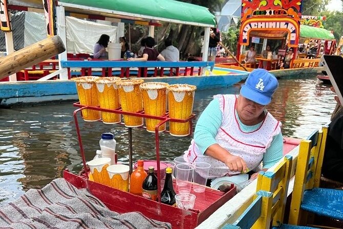 Mixology, Food, Wine and Beer Experience in Xochimilco - Boarding a colorful trajinera in Xochimilco