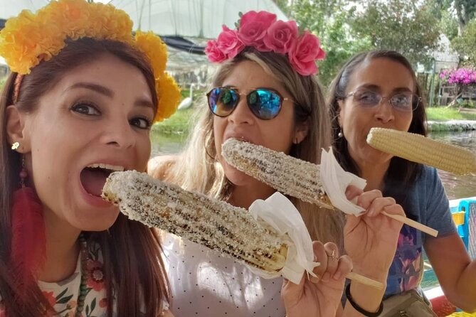 Trajinera ride in Xochimilco - Greenhouses, crafts, and local stops along the canals