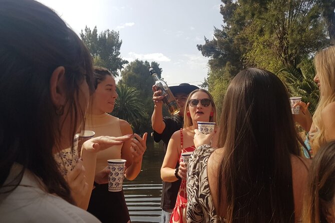"Xochimilco: A Floating Mexican Fiesta" - Drinks, chicharrones, and service that matters