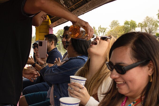 Xochimilco BOAT LIGHT PARTY WITH 1 DRINK AND 4 TAQUITOES + 18 - Value at $49 per person