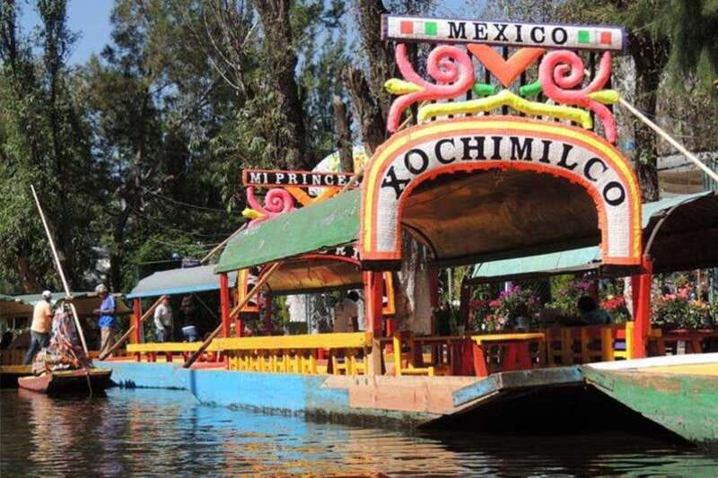 Xochimilco floating gardens, Coyoacan and UNAM murals - UNAM murals and Olympic Stadium in about 20 minutes