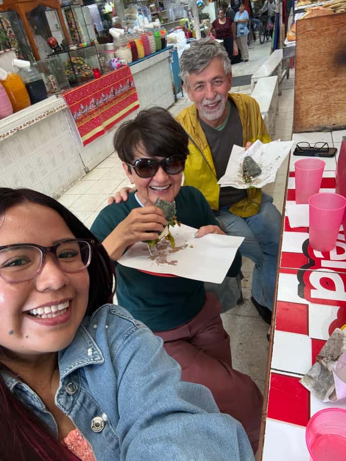 Xochimilco: Food and Trajinera Ride with Local Women - Eating quesadillas, tacos, and tlacoyos