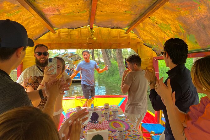 Xochimilco International boat party with open bar and tacos - Music, dancing, and the role of Allen and Alex